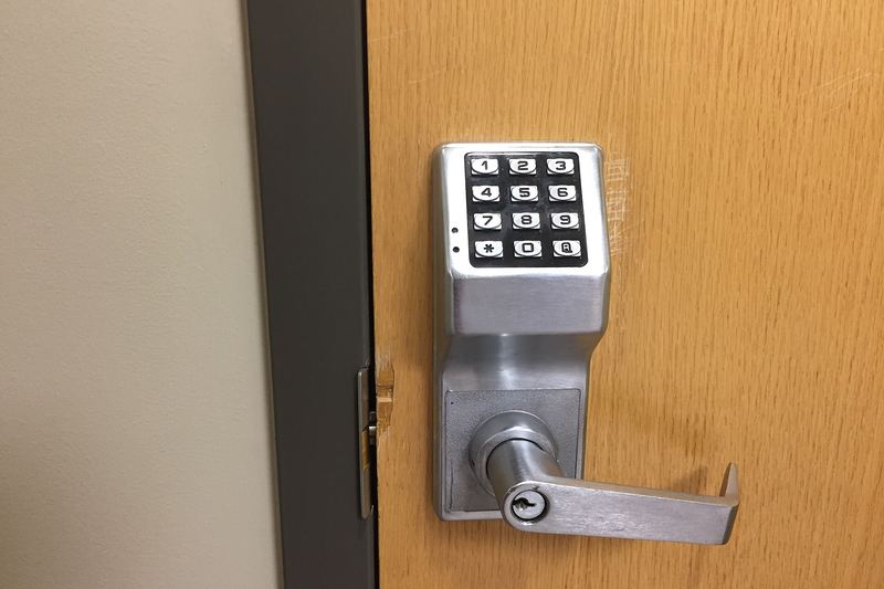 Keypad lever lock on a commercial door
